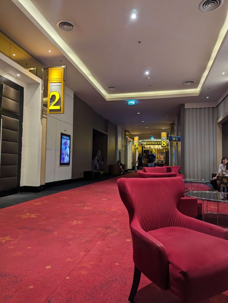 Movie theater in bangkok with red hallway