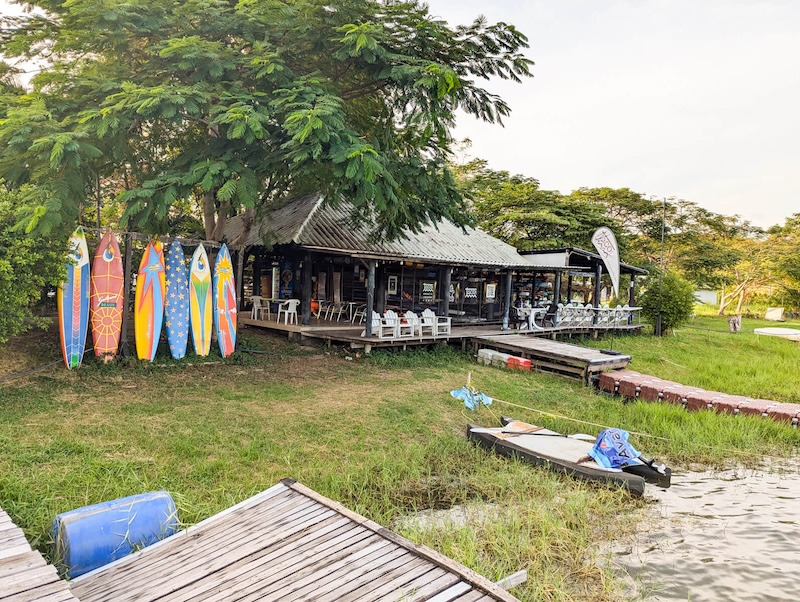 Surfboards and other water equipment at Taco lake in Bangkok