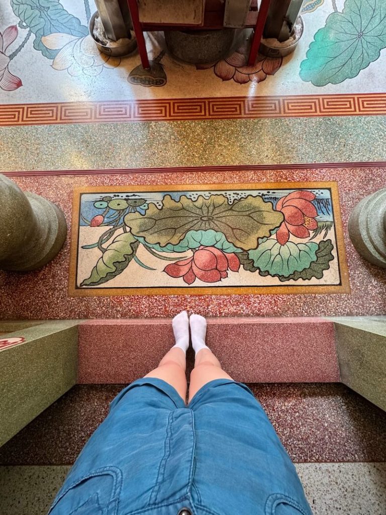 Entering the worship area with just socks on to preserve the ceramic