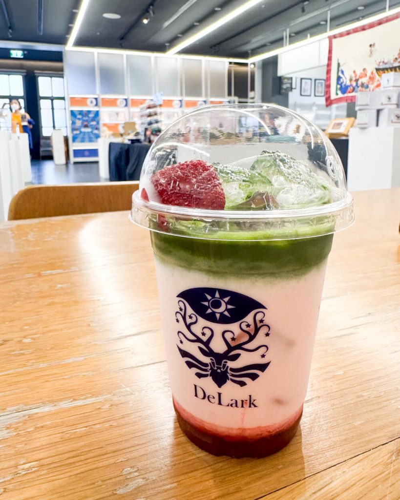 Strawberry matcha latte in a bookstore/gift shop