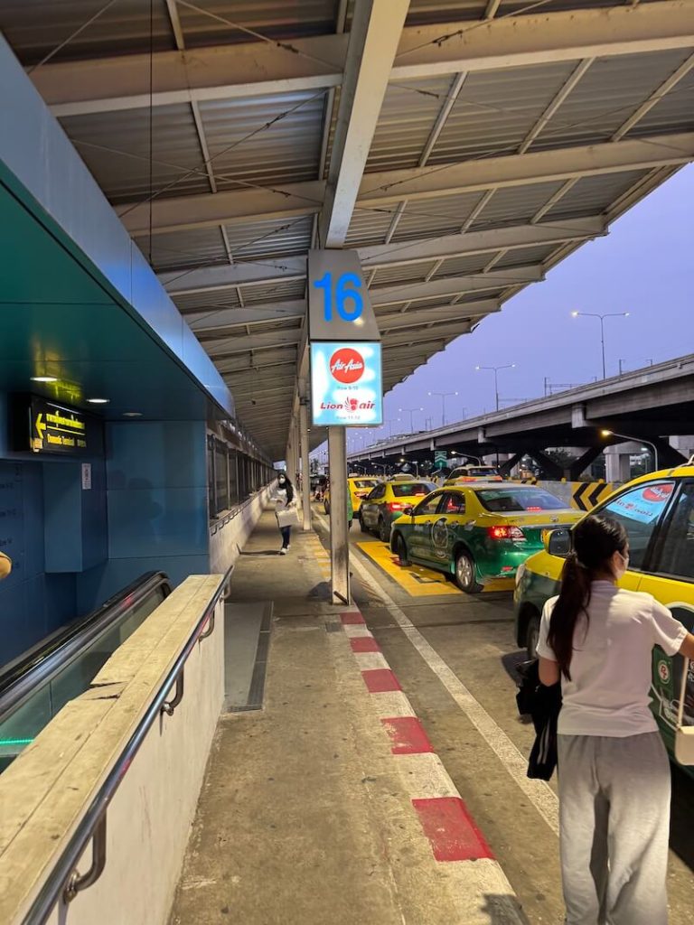 Taxis at BKK airport in the early morning light