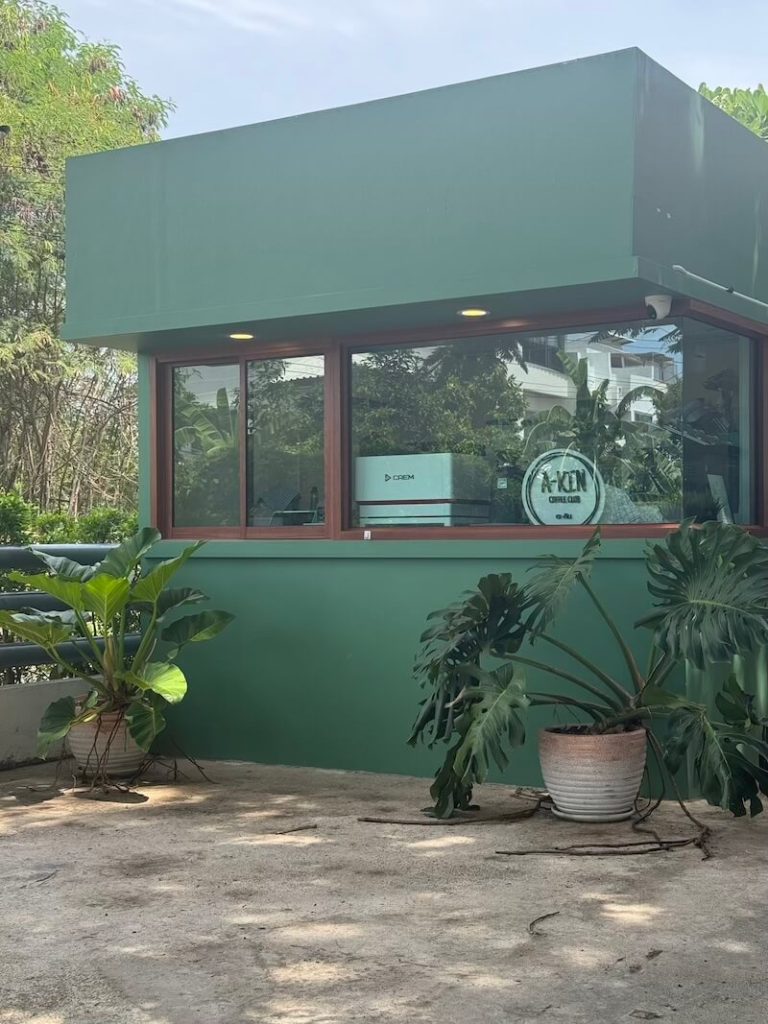 Green coffee stand at a-kin coffee club